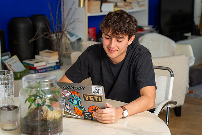 Student of Academy online in his home in Paris, France